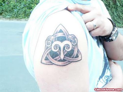 Celtic Knot And Aries Zodiac Tattoo On Right Shoulder