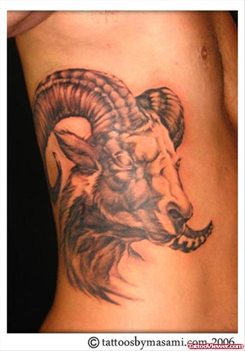 Attractive Grey Ink Side Rib Goat Head Aries Tattoo