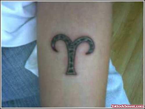 Black Aries Tattoo On Left Arm