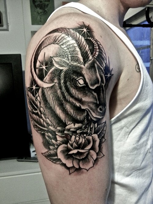 Grey Flower And Aries Head Tattoo On Shoulder