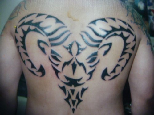 Tribal Aries Tattoo On Back Body