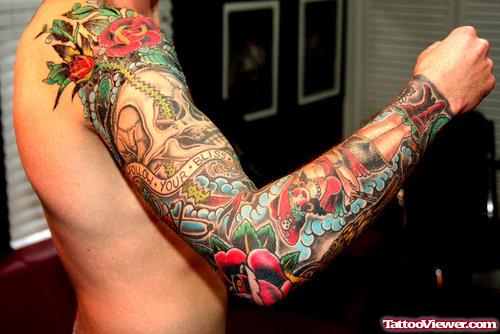 Red Flowers And Skull Tattoo On Right Arm