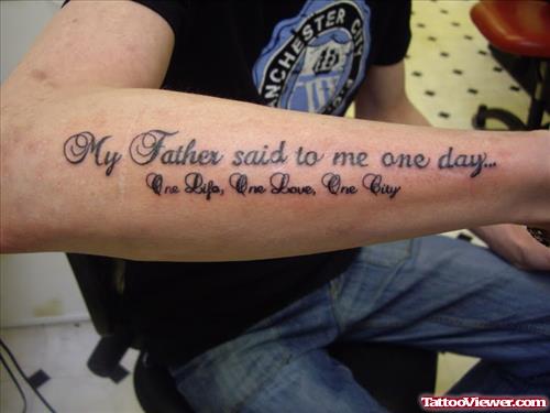 Lettering Tattoo On Guy Right Arm