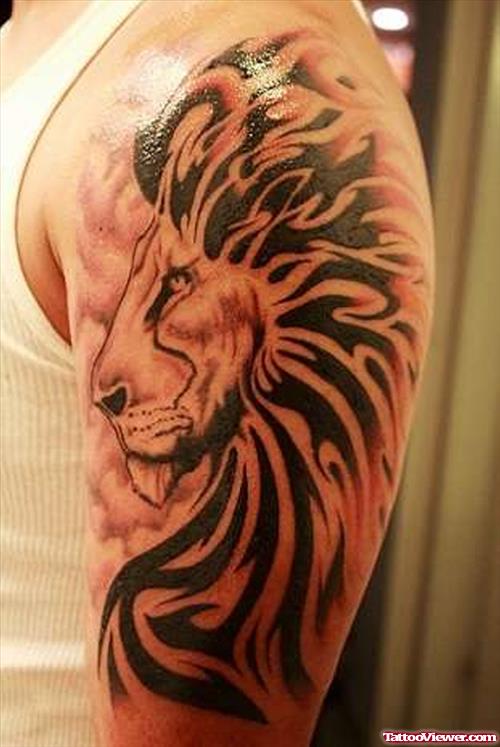 Tribal Lion Head Tattoo On Left Arm