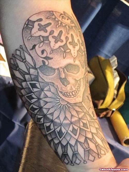 Grey Ink Skull And Mandala Flower Tattoo On Right Arm