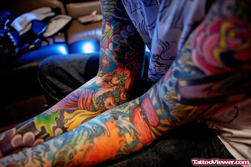 Colored Ink Lord Ganesha Tattoo On Arm