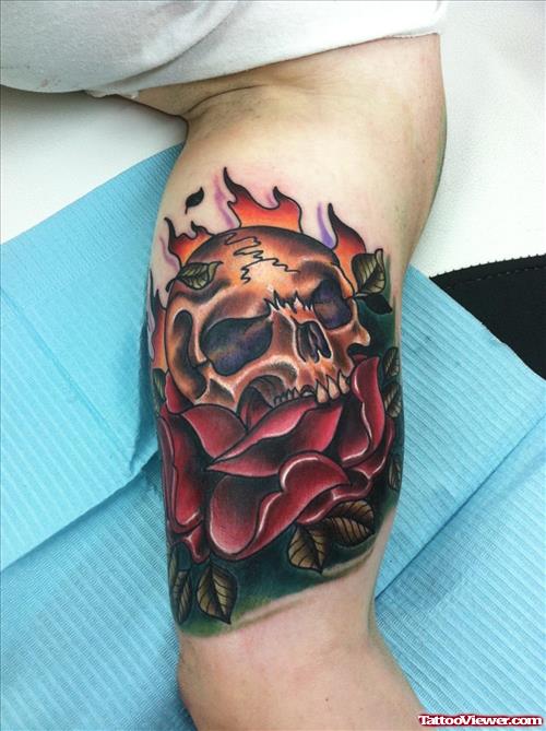 Red Rose Flower And Skull Tattoo On Left Arm