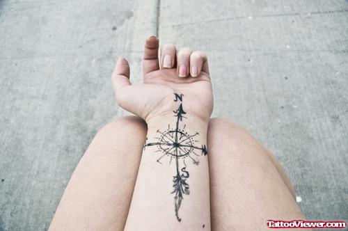 Grey Ink Compass Tattoo On Left Wrist
