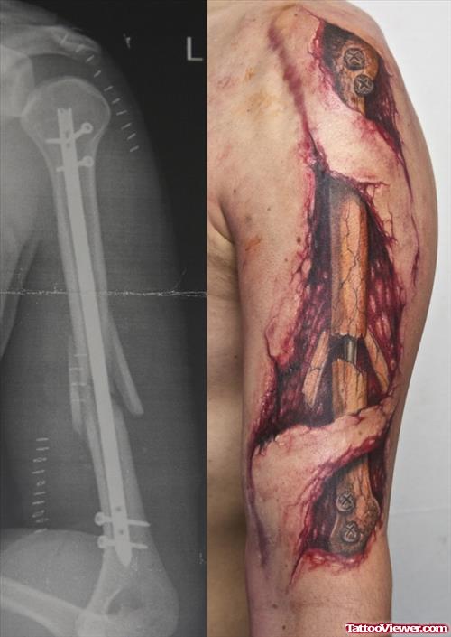 Broken Arm Ripped Skin Tattoo On Left Arm
