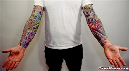 Man Showing Arm Tattoos