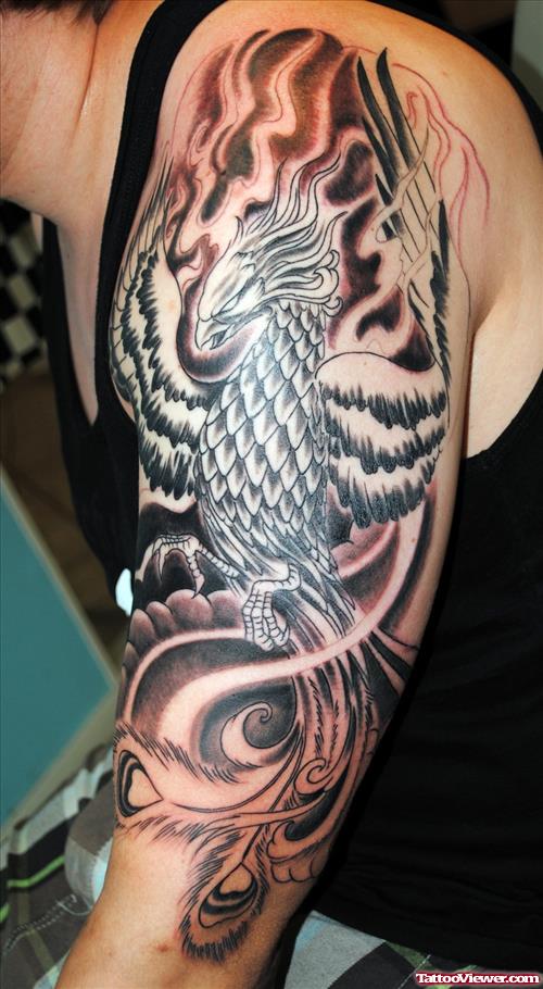 Flying Phoenix Tattoo On Left Arm