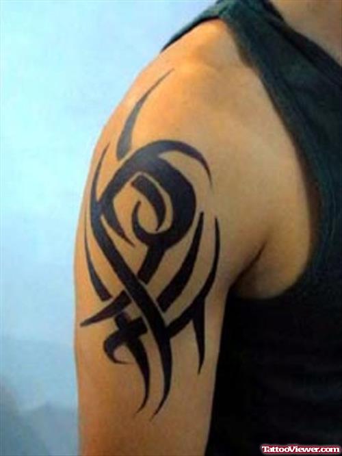 Black Ink Tribal Tattoo On Right Half Sleeve