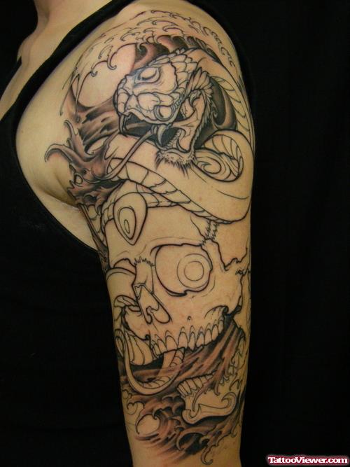 Grey Ink Dragon And Skull Tattoo On Left Arm