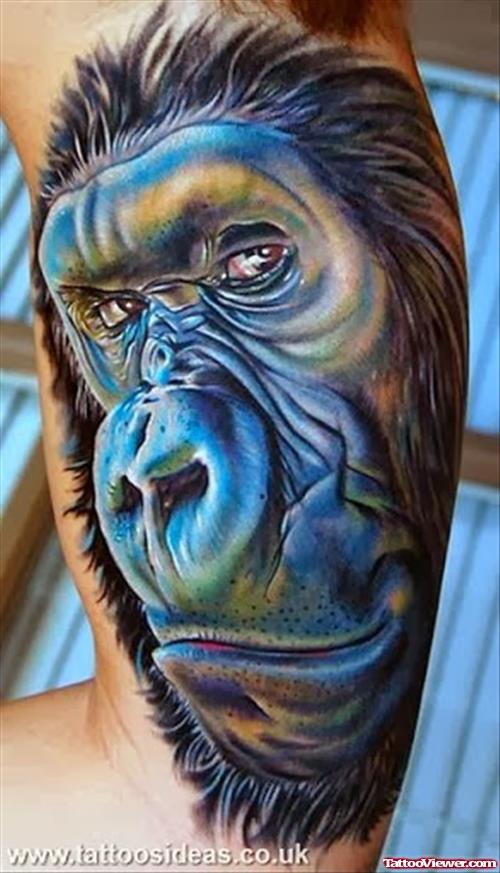 Color Ink Gorilla Face Tattoo On Arm