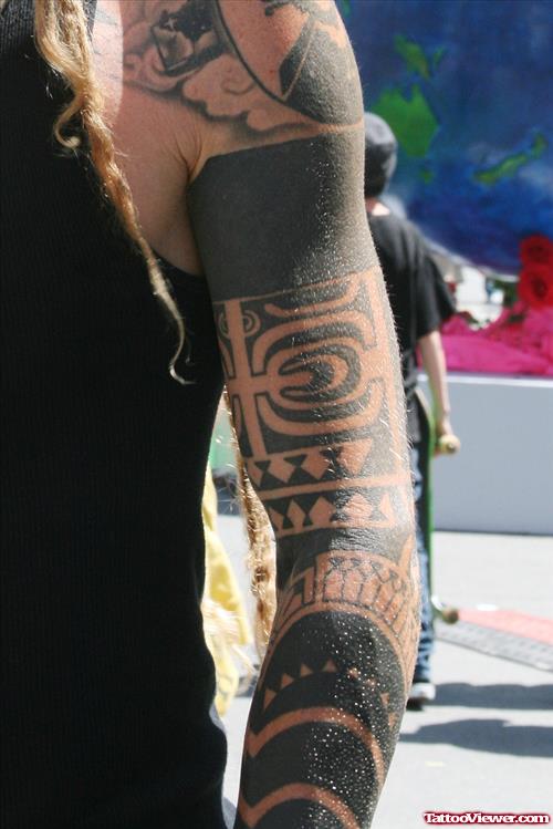 Black Ink Tribal Left Arm Tattoo