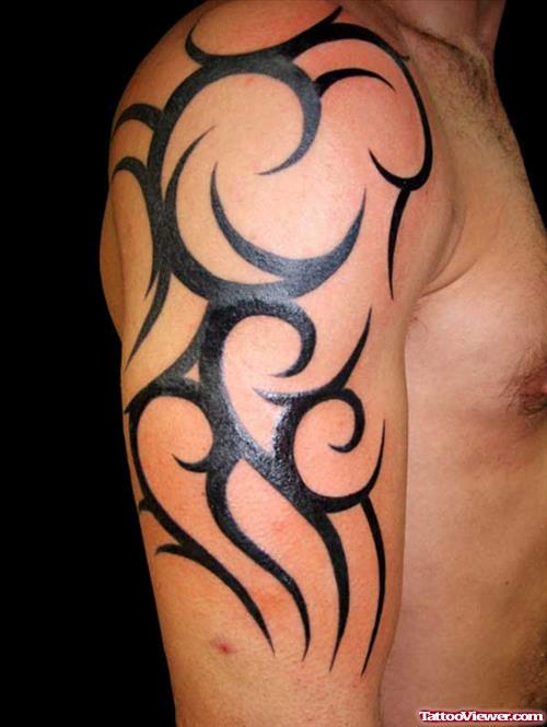 Awesome Right Arm Tribal Tattoo For Men