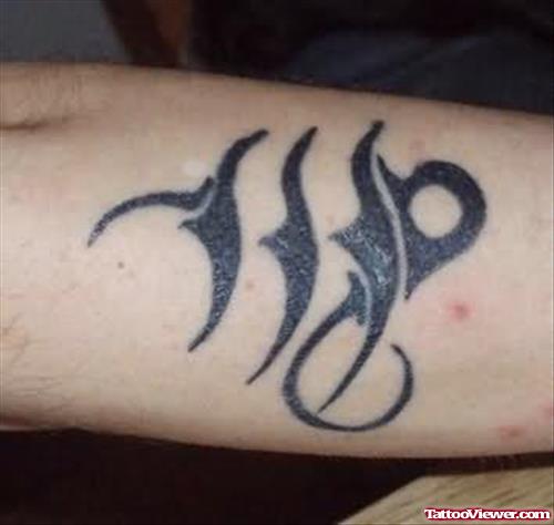 Black Virgo Tattoo On Arm