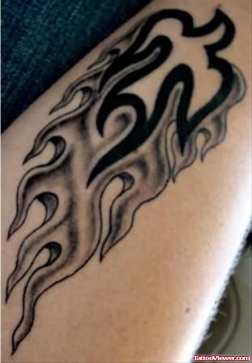 Black Flame Tattoo On Arm