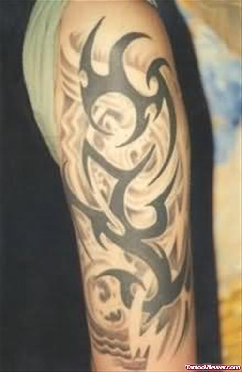 Tribal Tattoo On Upper Arm