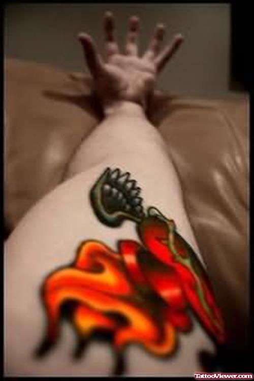 Red Flame Tattoo On Arm