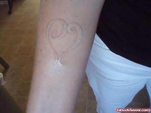 White Ink Heart Tattoo On Arm