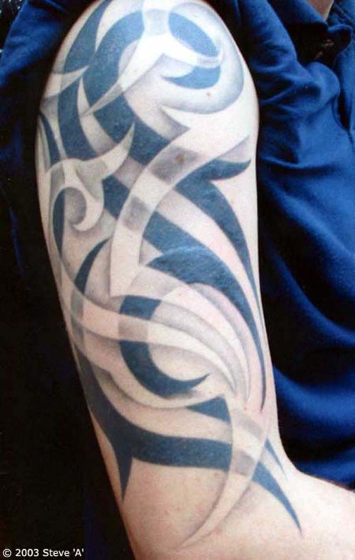 Grey And Black Tribal Arm Tattoo