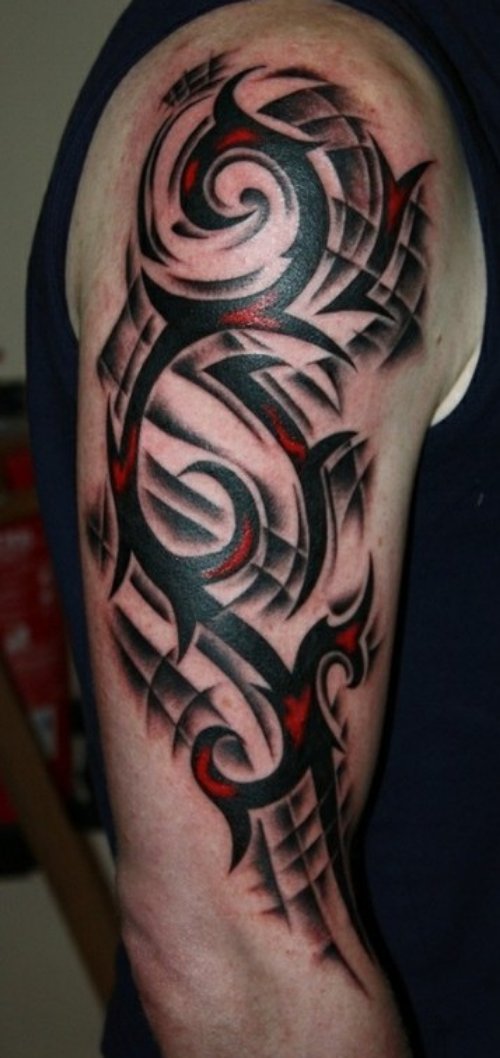 Red And Black Tribal Tattoo On Right Arm