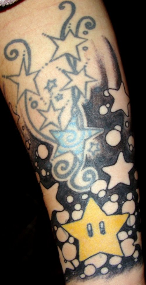 Colored Stars Arm Tattoo