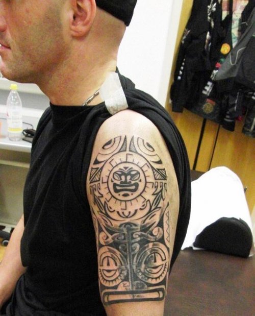 Sun Tribal Tattoo On Left Half Sleeve