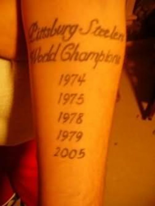 Sports Years Tattoo On Arm