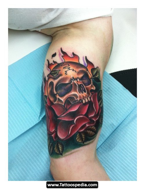 Red Flower And Skull Tattoo On Bicep
