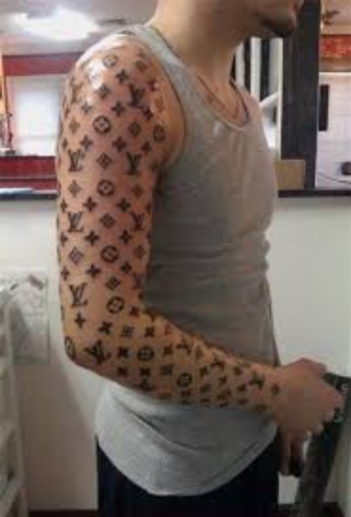 Black Dots Tattoos On Right Arm
