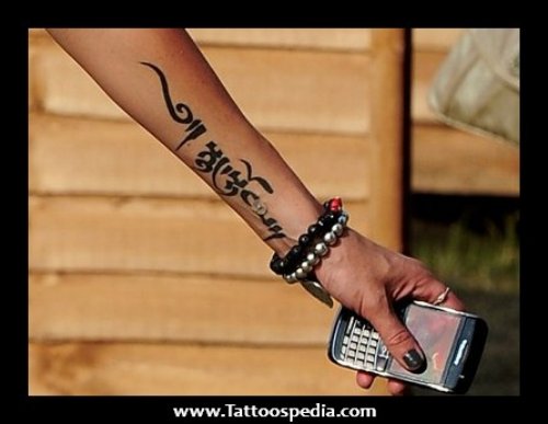 Amazing Black Tribal Arm Tattoo For Girls