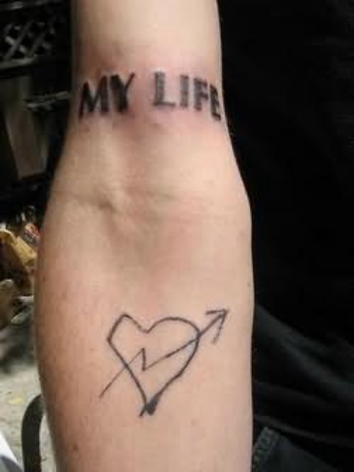 Cool Words & Heart Tattoo On Arm