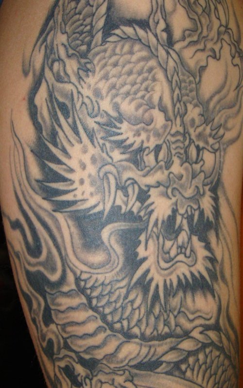 Beautiful Grey Ink Dragon Tattoo On Arm