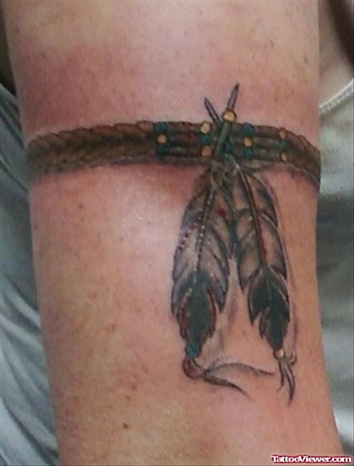 Grey Ink Native American Armband Tattoo On Bicep