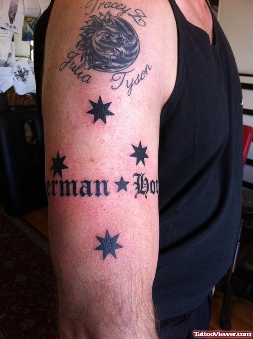 Black Stars And Words Armband Tattoo