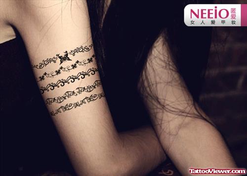 Swirl Designs Armband Tattoos On Girl Bicep