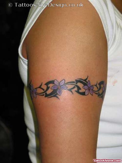 Purple flower And Tribal Armband Tattoo