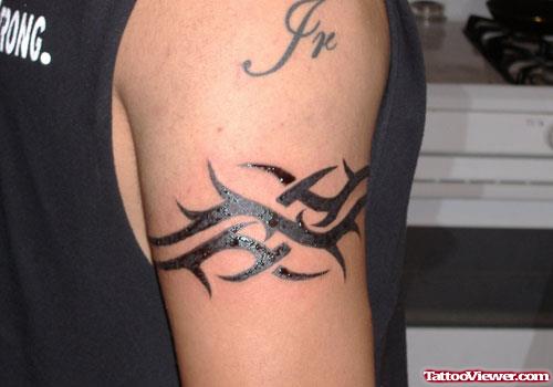 Black Ink Tribal Armband Tattoo On Bicep