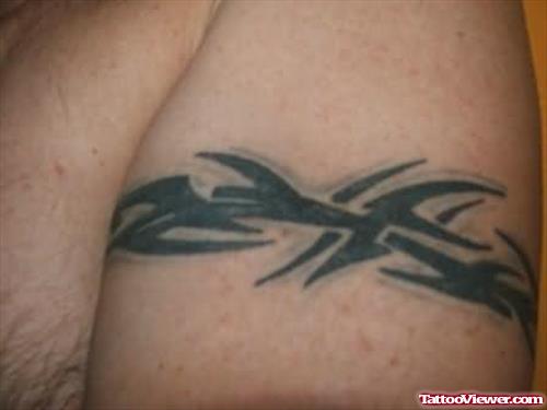 Amazing Arm Band Tattoo On Muscle