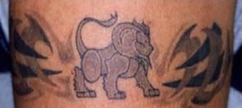 Lion Band Tattoo On Muscle