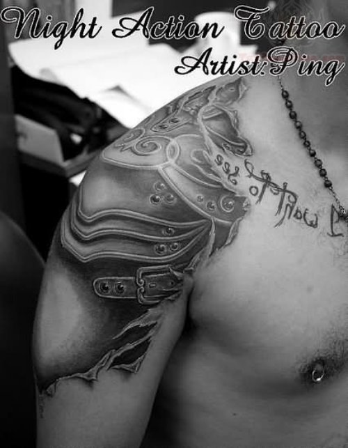 Grey Ink Armour Tattoo On Shoulder