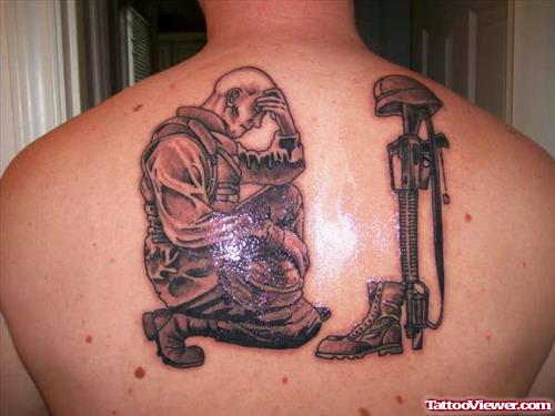 Sad Soldier Army Tattoo On Man Upperback