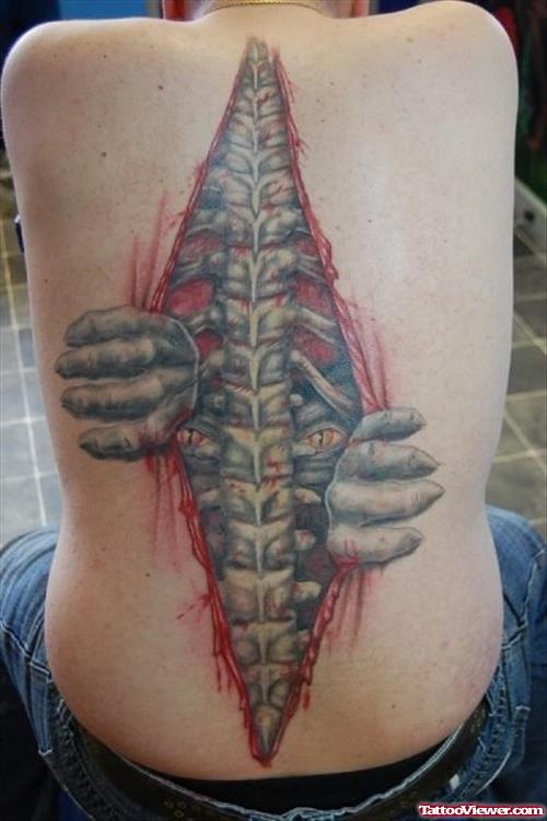 Ripped Skin Army Tattoo On Back Bone