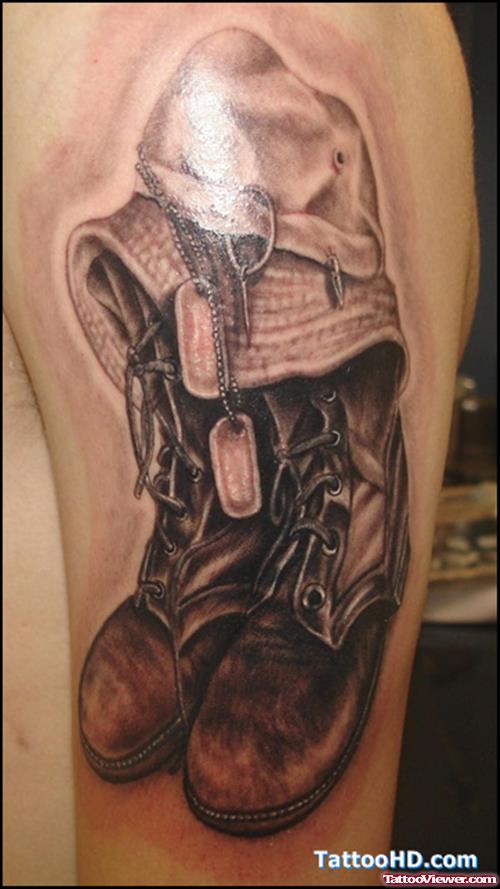 Grey Ink Boots And Cap Army Tattoo On Half Sleeve