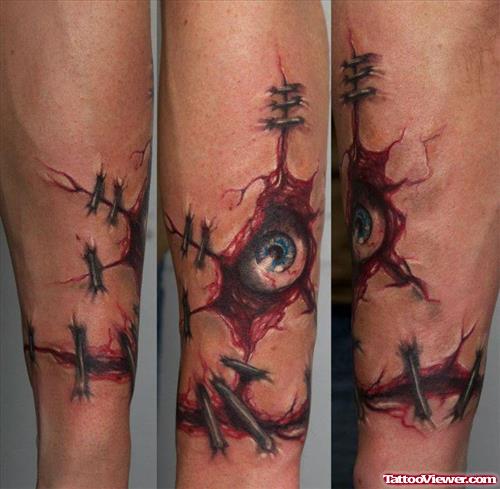 Ripped Skin Eye Army Tattoo