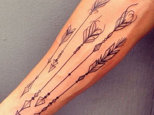 Group Of Arrows Tattoo On Leg