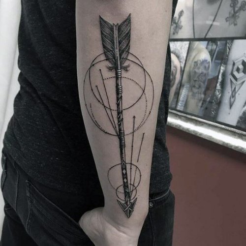 Arrow In Circles Tattoo On Outer Arm