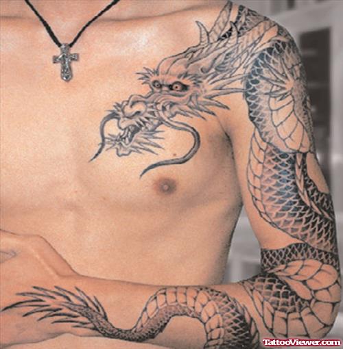 Grey Ink Dragon Asian Tattoo On Man Left Sleeve